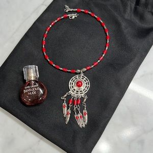 Women necklace with small full bottle perfume
